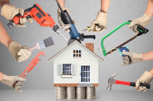 Selection of tools in the shape of a house, home improvement concept